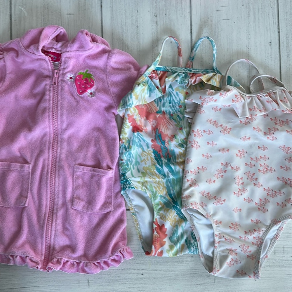 Girls bathing suits and cover up.